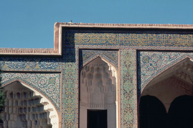 Courtyard detail of madrasa; muqarnas domes and tile decoration on southern iwan and flanking niches