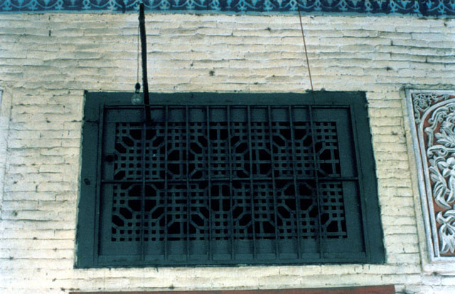 Detail of screened upper window, on wall enclosing inner prayer hall