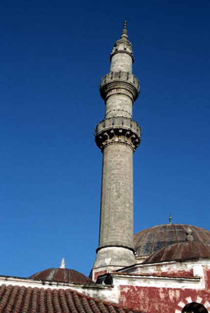 Exterior view showing minaret and mosque domes