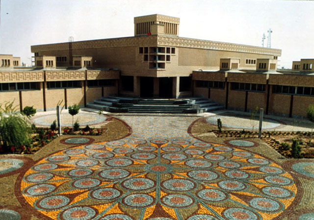 View across mosaic paved courtyard