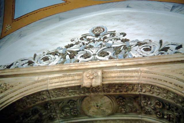 Interior detail; carved marble archway and neo-baroque molding