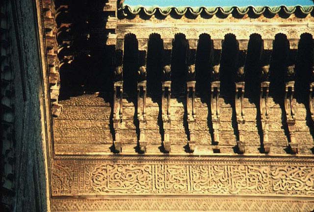 Madrasa al-Bu'inaniya - Courtyard, detail of carved wood cornice