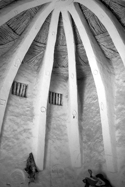 Interior, Takatcho, a simple domed structure intended to replace the straw hut built by women