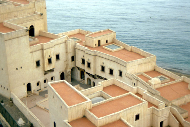 Aerial view showing rooftops and asymmetrical plan