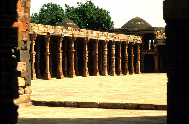 Exterior general view of courtyard of great mosque from the gate, showing stacked columns of colonnade