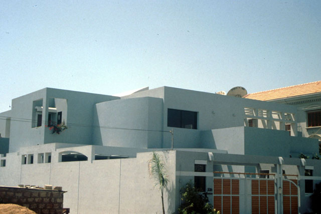 Exterior view showing white washed façade
