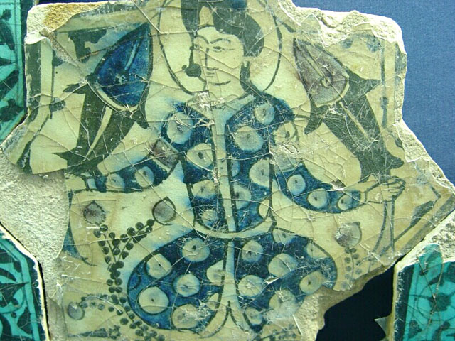Young man with fish on eight-pointed star tile  (Karatay Museum, Konya)