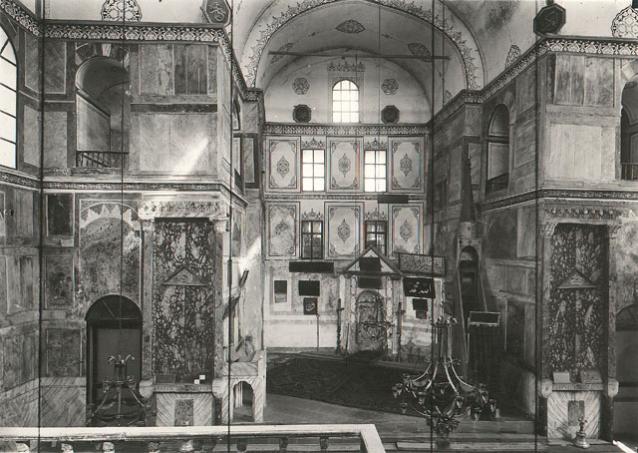 Interior view looking towards sanctuary from the women's prayer area above the entrance, prior to restoration