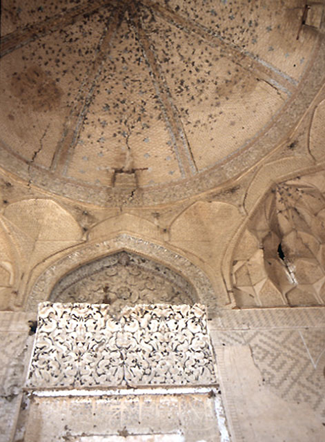 Interior view of the dome, zone of transition, and upper section of the mihrab
