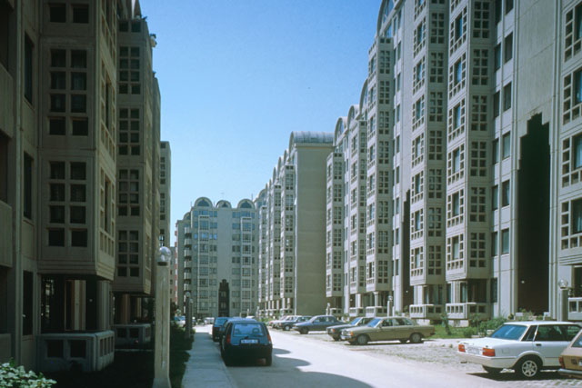 Exterior view between high-rise, modular housing