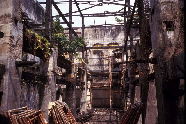 Interior view of mansion gutted by fire, before restoration