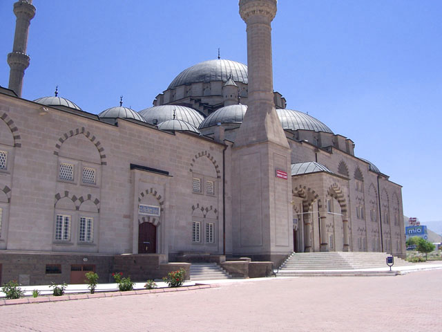 Exterior view from northwest, showing side entrances to courtyard and prayer hall