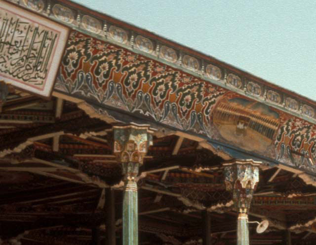 Altun Mosque - Detail of column capitals, ceiling decoration and portico soffit with painting of the Ka'ba