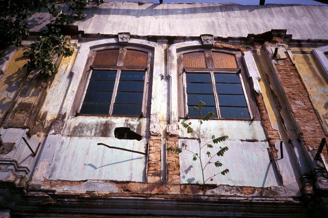 Detail of windows damaged by fire, before restoration
