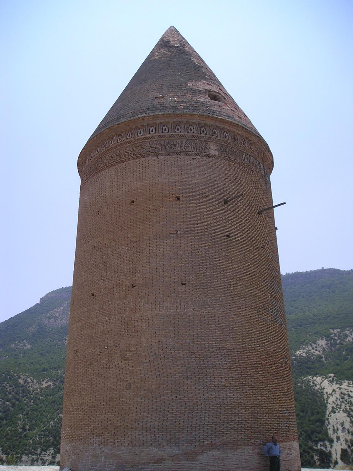 Exterior view showing decorative bands below conical dome