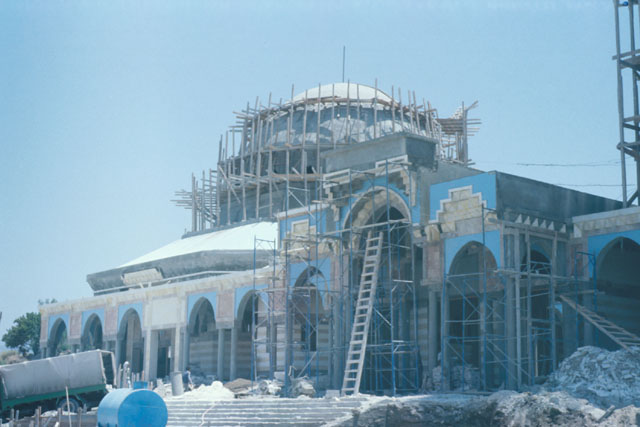 Exterior view showing façade behind extensive scaffolding