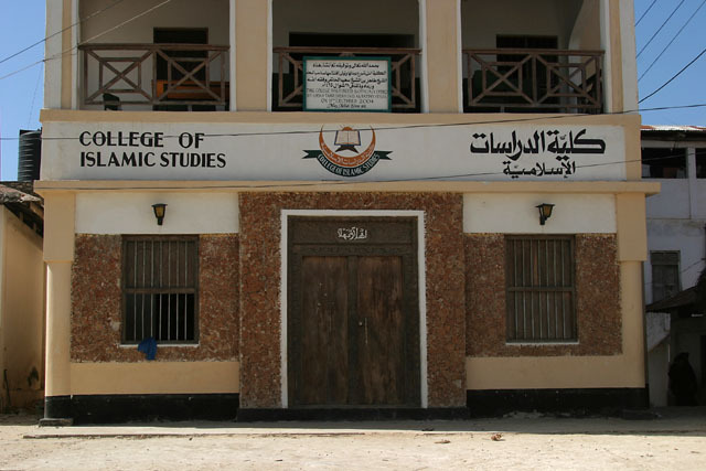 College of Islamic Studies - Exterior view of front façade showing pointed arch openings in second and third floor balconies