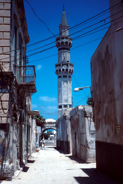 Minaret of Quirgi mosque, al-Kwash Street, The Arch of Marcus Aurelius is at the end of the street