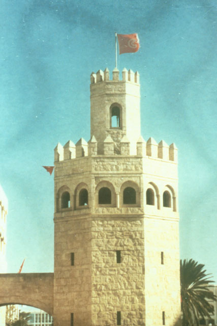 Exterior view showing stone tower façade