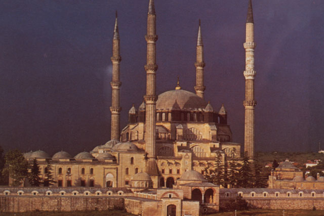 Exterior view showing distinctive minarets and domes