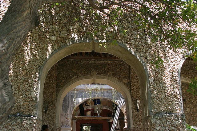 Detail view of coral rag wall above arched entrance portico