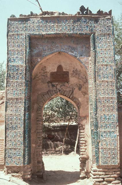 Gate to prayer hall with high-relief circular patterned tiles