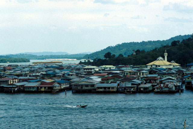 Aerial view showing coastal settlement on stilts