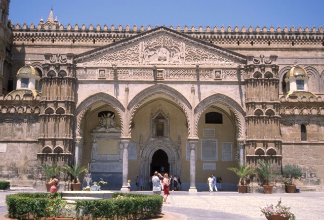 Exterior view from south showing main portal with three-arched portico (b. 1429)