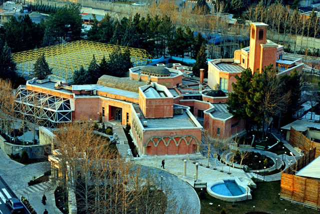 Aerial view showing arrangement of buildings beside courtyard