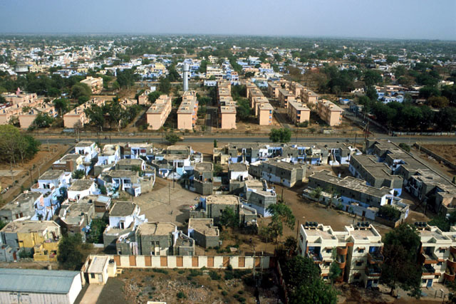 Aerial view over the complex showing both cluster and row housing