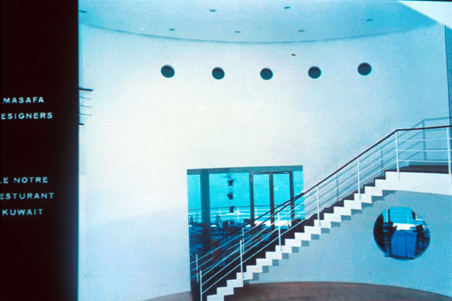 Interior view showing sight lines from central stair well to dining area to view