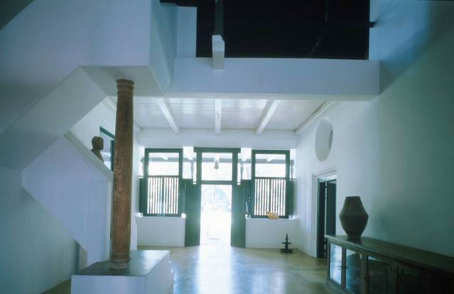 Interior view showing double story entrance foyer and clerestory windows