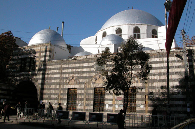 Jami' Darwish Basha - Exterior view from east showing the large dome of the prayer hall, and the domed gate of street behind qibla wall