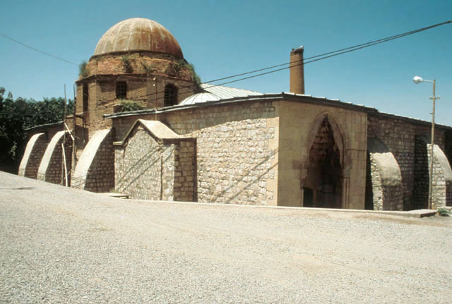 Exterior view from southeast, with sanctuary dome and portal