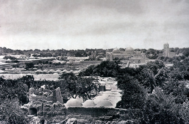 Elevated distant view of the shrine from northeast, circa 1916-1917, across roofs of city structures