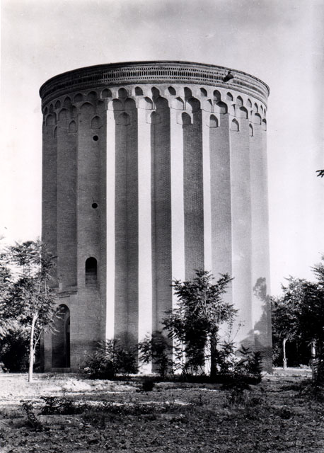 Exterior view of tomb tower from west, with the northern entrance seen on the left; the stairway, which begins above the entrance, was probably accessed with a wooden ladder