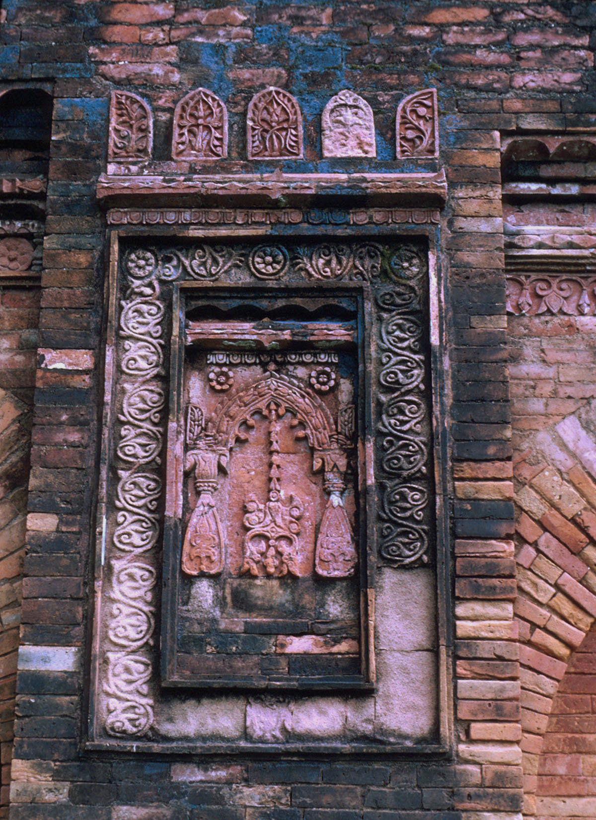 Terra cotta panel with ornamental hanging lamp motif
