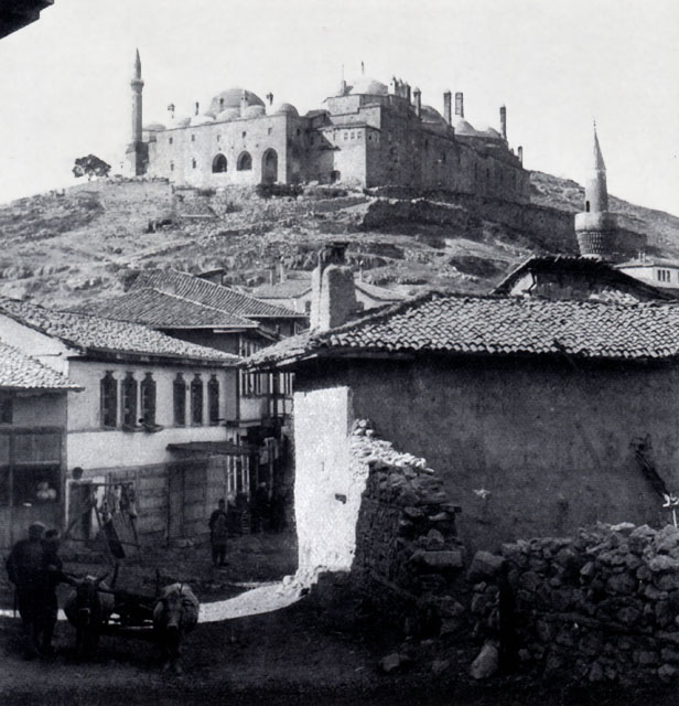 Exterior view from northwest showing convent on hill with village below