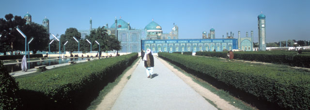 General view of the complex and surrounding park from southwest, looking towards qibla wall of new mosque. Domes of the Timurid shrine appear in the background