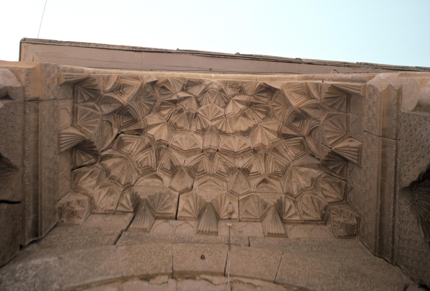 Detail of east portal, looking up at muqarnas crown