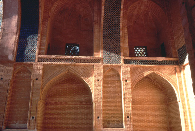 View of iwan, looking at side niches with balconies above