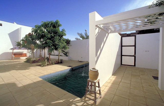 Private entry courtyard, pool and garden wall