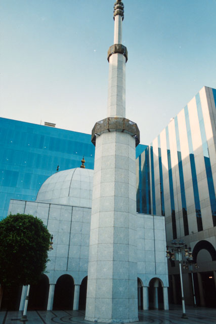 Exterior view showing minaret piercing through frame