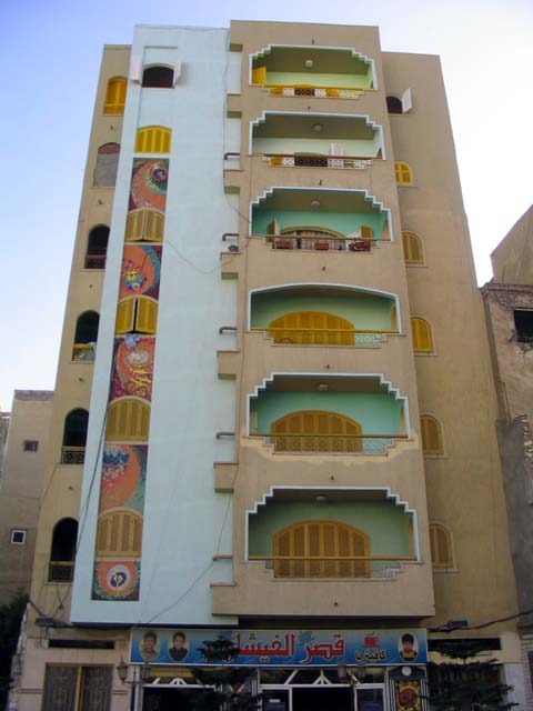 Recent residential construction facing the mosque of Abu al-Abbas al-Mursi