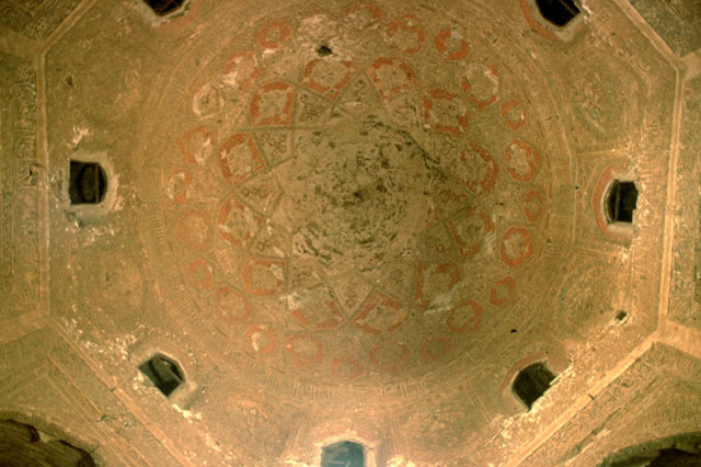 Interior view, looking up polychrome stucco work on dome