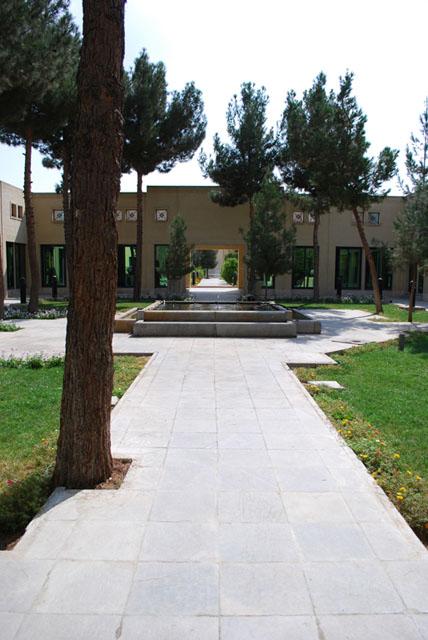 View from within administrative complex courtyard along main site axis, toward the factory mosque