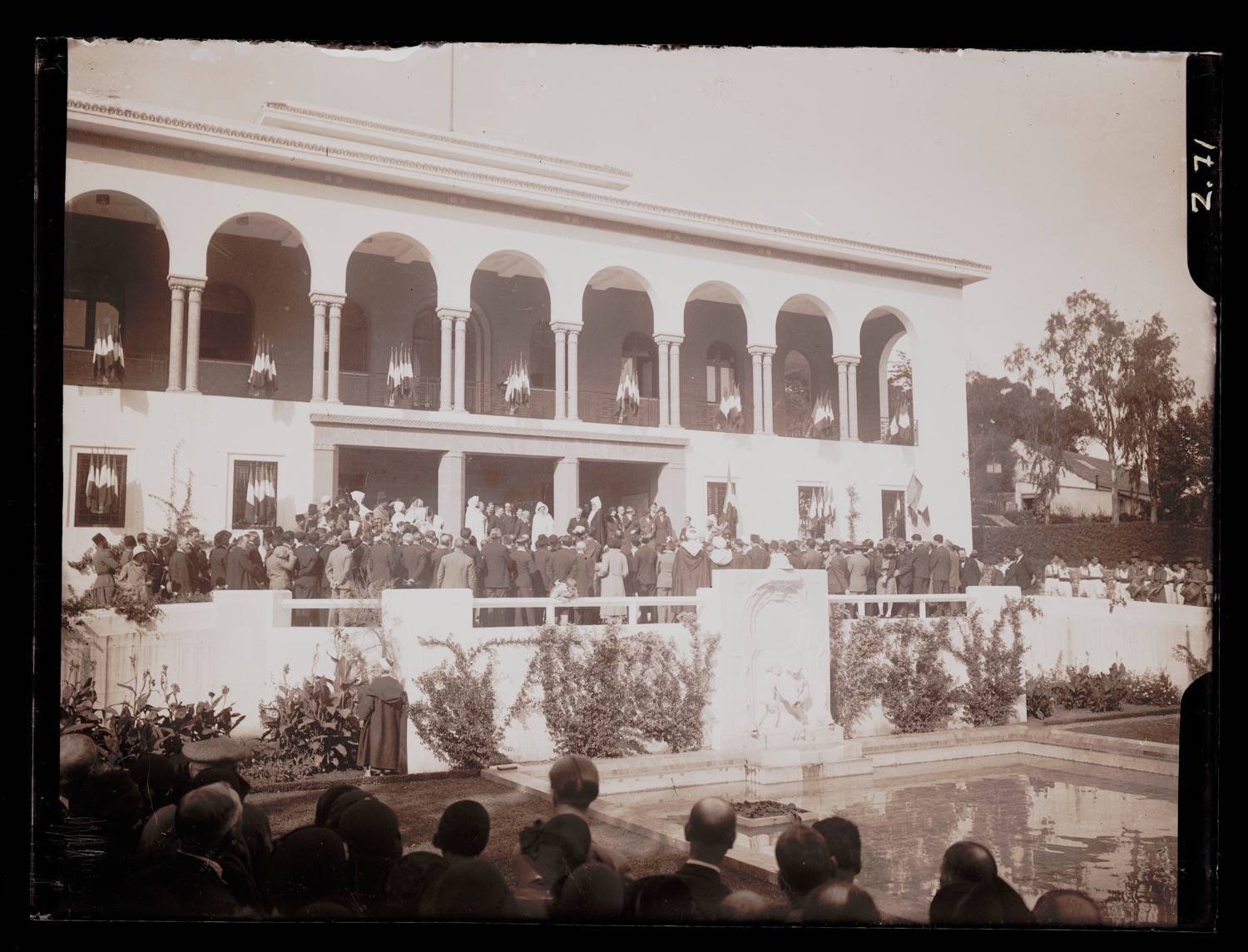 Exterior view of a gathering at the French Consulate