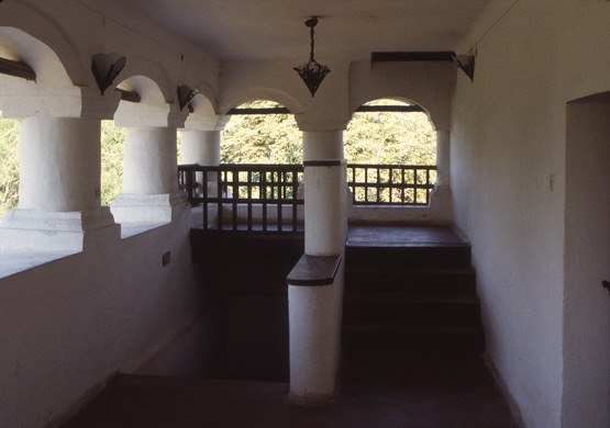 <p>The uppermost level contains a cerdac (open gallery with special sitting platform); the same word exists in Bulgarian, Serbian, and Russian as čardak. This space, with protective walls, short columns, and arches, includes a raised platform for occupants to sit and enjoy the landscape beyond. The lighter wooden latticework gives a more delicate and open edge to the cerdac.</p>