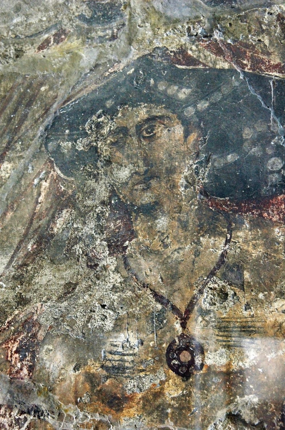 View of fragment of a fresco taken from the audience hall, west face of east archway, depicting woman with jewelry.