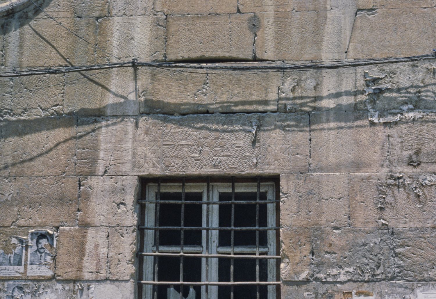 View of window with decoration over the lintel.&nbsp;